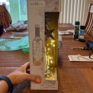 Brand new Atlantis lighting starfish wine bottle